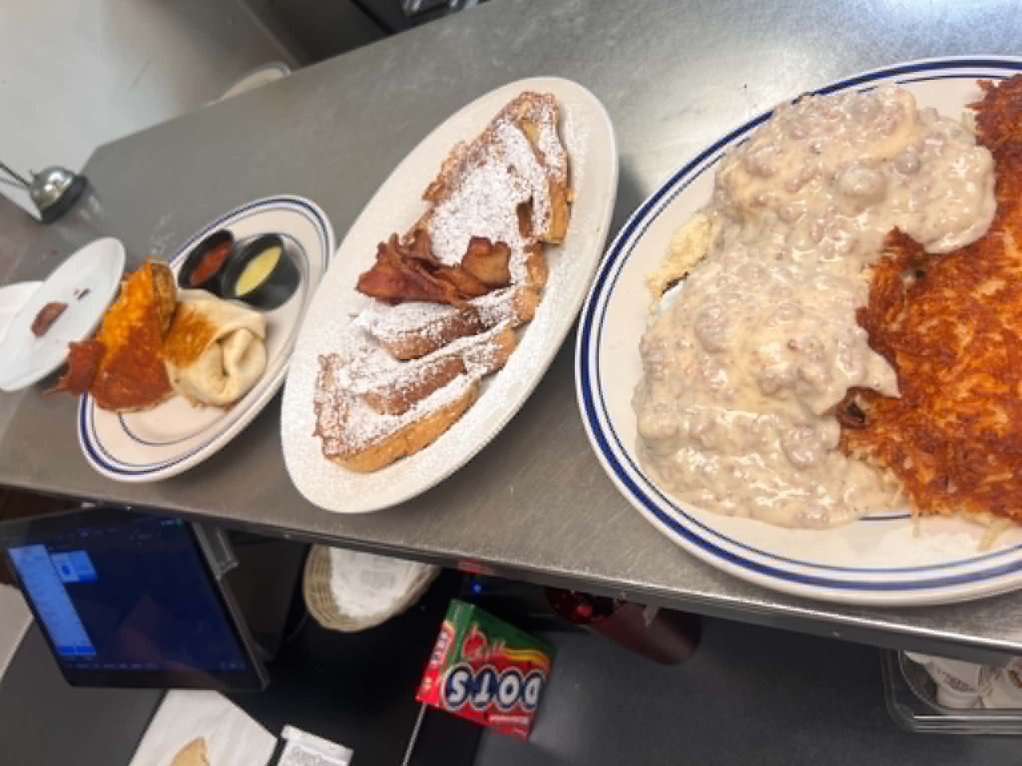 Biscuits and gravy with golden hash browns