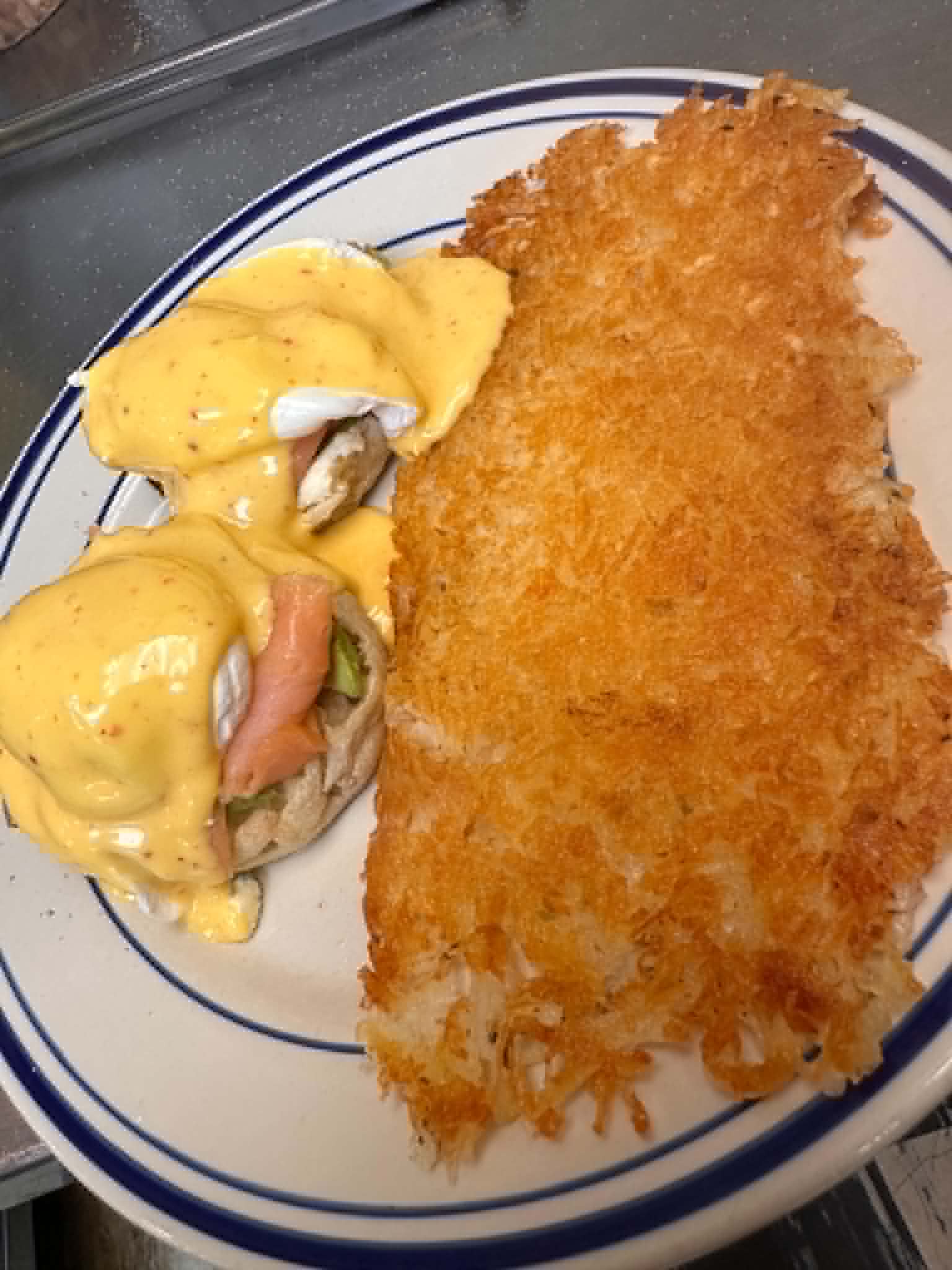 Eggs Benedict with hash browns